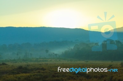 Sunrise Behind The Mountain Stock Photo