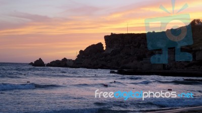 Sunrise In A Mediterranean Island Malta With A Cloudy Sky In Summer Stock Photo