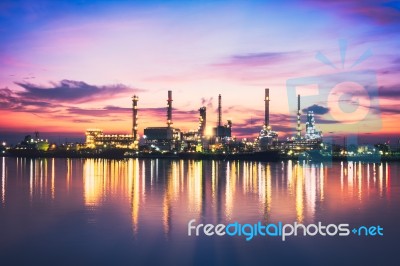 Sunrise Oil Refinery At Twilight In Bangkok, Thailand Stock Photo