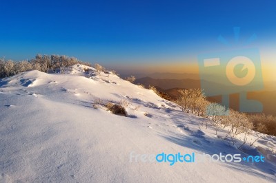 Sunrise On Deogyusan Mountains Covered With Snow In Winter,south Korea Stock Photo