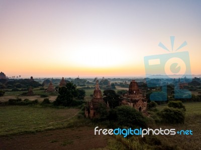 Sunrise Over Religious Temples Stock Photo