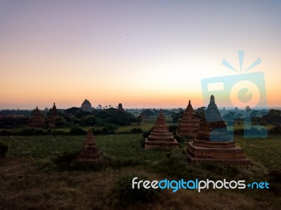 Sunrise Over Religious Temples Stock Photo