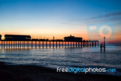 Sunrise Over Southwold Pier Stock Photo