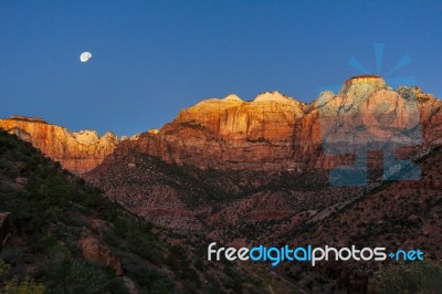 Sunrise Over The Towers Of The Virgin And The West Temple Stock Photo