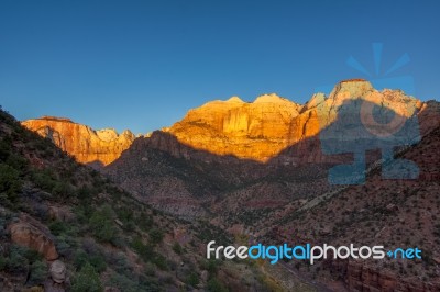 Sunrise Over The Towers Of The Virgin And The West Temple Stock Photo