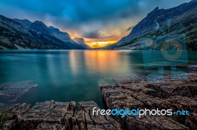 Sunset At St. Mary Lake, Glacier National Park, Mt Stock Photo