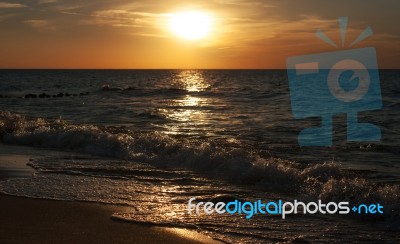 Sunset At The Sea On Autumn Stock Photo