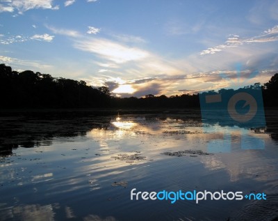 Sunset In The Amazon Stock Photo