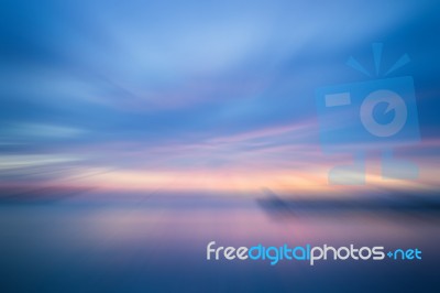 Sunset In The Sea With Radial Blur Background Stock Photo