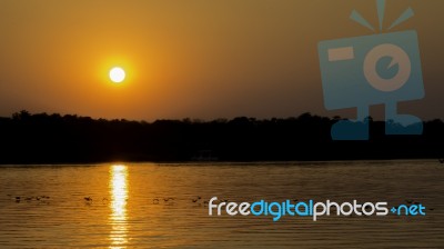 Sunset In Zambezi River, Victoria Falls, Zimbabwe, Africa Stock Photo