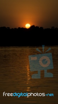 Sunset In Zambezi River, Victoria Falls, Zimbabwe, Africa Stock Photo