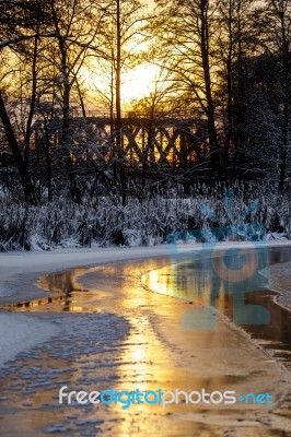 Sunset On The River In Winter Stock Photo