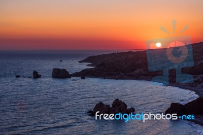 Sunset Over Aphrodite's Rock Stock Photo