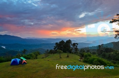 Sunset Over Hills At Campsite On The High Mountain Stock Photo