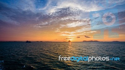 Sunset Over The Sea In Thailand Stock Photo