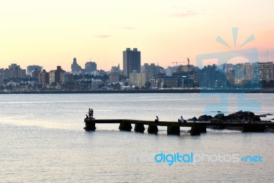 Sunset Scene Of Beach And Skyline At Background, Montevideo, Uru… Stock Photo