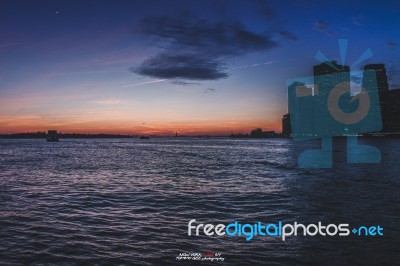 Sunset X Statue Of Liberty, Manhattan, New York City, Ny Stock Photo