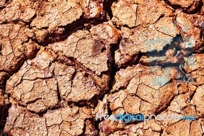 Surface Of Dry Soil In Summer Stock Photo