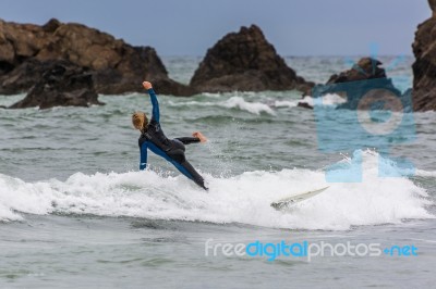 Surfing At Bude In Cornwall Stock Photo