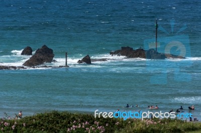 Surfing In Bude Stock Photo