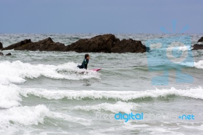 Surfing In Cornwall Stock Photo