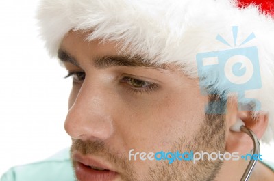 Surgeon Doctor Wearing Santa Hat Stock Photo