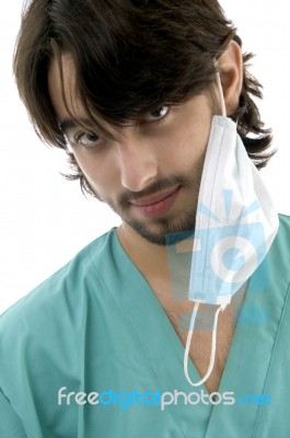 Surgeon In Scrubs And Face Mask Stock Photo