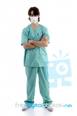 Surgeon In Scrubs With Facemask Stock Photo