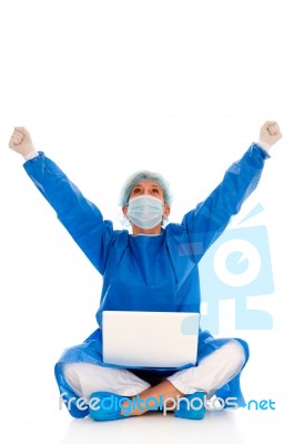 Surgeon Rejoices With Laptop Stock Photo