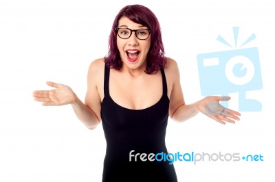 Surprised Bespectacled Pretty Teen Stock Photo