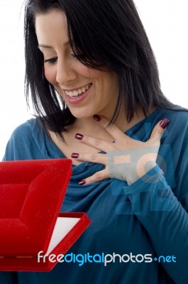 Surprised Woman Looking Jewelry Box Stock Photo