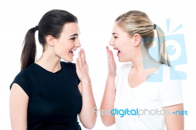 Surprised Young Girls Laughing Out Loud Stock Photo