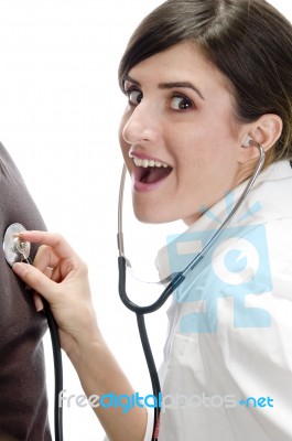 Surprising Doctor With Stethoscope Stock Photo