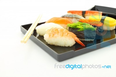 Sushi Black Rectangle Plate Focus Shrimp On White Desk Stock Photo