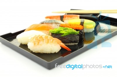 Sushi Black Rectangle Plate Focus Shrimp On White Table Stock Photo