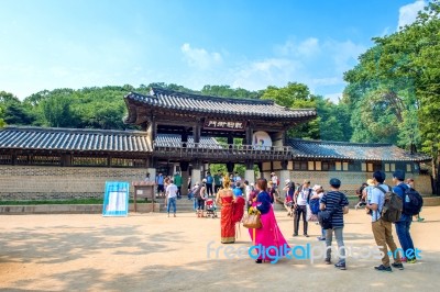 Suwon, South Korea - July 5: Korean Folk Village,traditional Korean Style Architecture And Tourists In Korean Folk Village On July 5, 2015 In Suwon, South Korea Stock Photo