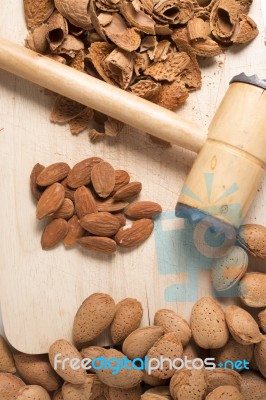 Sweet Almonds With Hammer Stock Photo