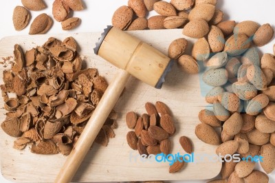 Sweet Almonds With Hammer Stock Photo