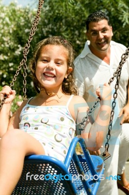 Sweet Girl On Swing Stock Photo