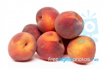 Sweet Peaches Isolated On A White Background Stock Photo