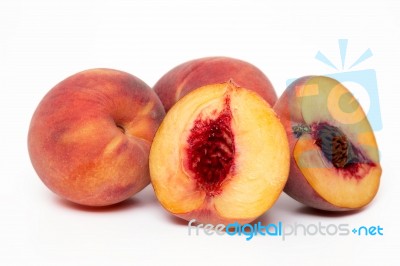 Sweet Peaches Isolated On A White Background Stock Photo