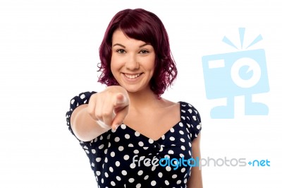 Sweet Woman Pointing At Camera Isolated Stock Photo