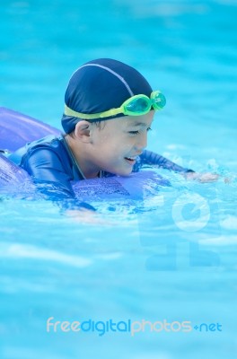 Swimming Kid Stock Photo