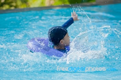 Swimming Kid Stock Photo