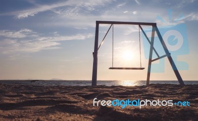 Swing On The Beach Stock Photo