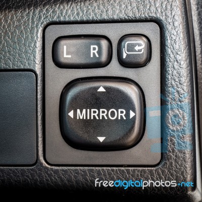 Switch Button Adjust Or Controls Side Mirrors In A Car Stock Photo