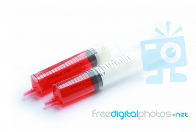 Syringe With Red Liquid Isolated On White Background Stock Photo