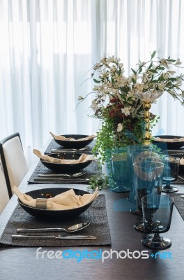 Table Set In Luxury Dinning Room Stock Photo