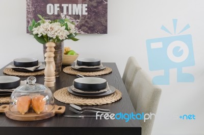 Table Set On Wooden Dinning Table Stock Photo