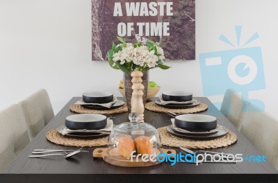 Table Set On Wooden Dinning Table Stock Photo